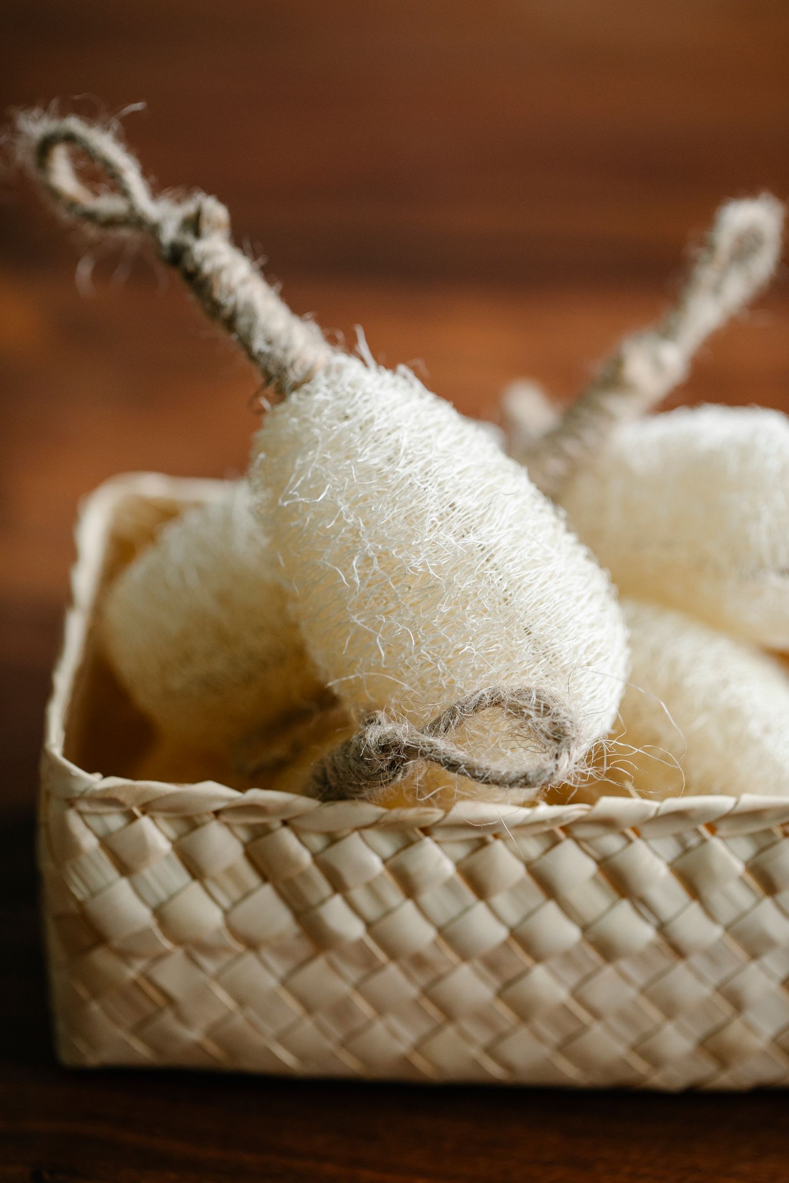 A basket of real bath accessories photographed indoors